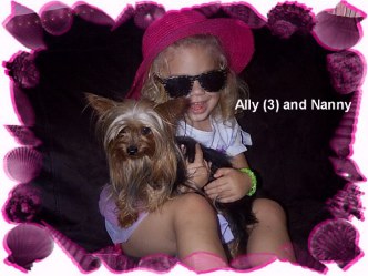Ally at age three with Nanny, a Little Paws dog